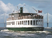 The Carolina Belle cruises along the Charleston Harbor  while on tour.