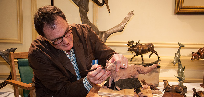 Sculptor works on a fox during the Quick Draw event at the Charleston Place Hotel during the Southeastern Wildlife Expo. © 2015 Audra L. Gibson. All Rights Reserved.